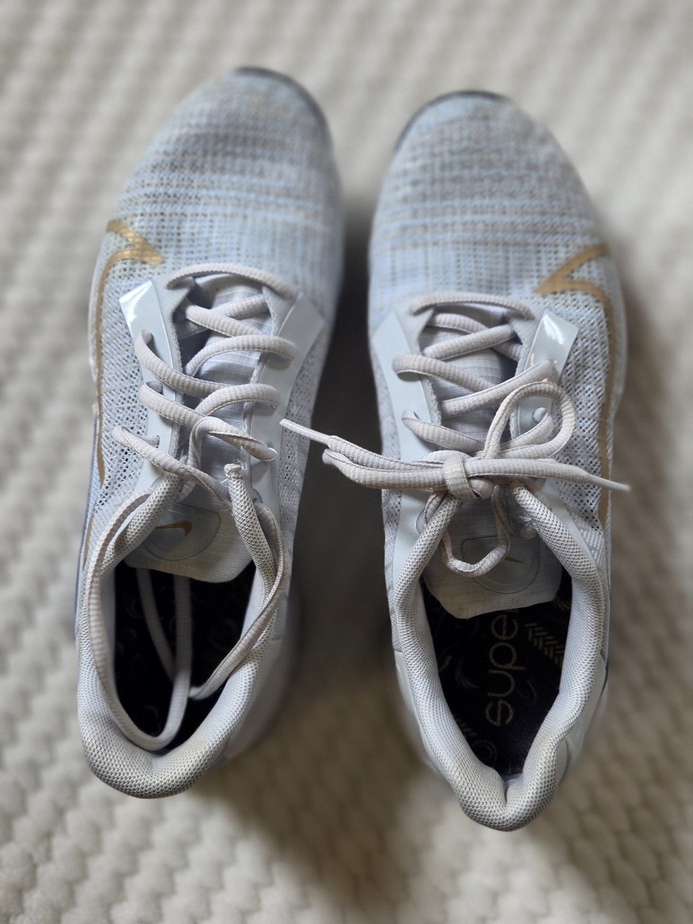 Nike Women’s Light Blueish and Gold Swoosh Lightweight Running Sneakers